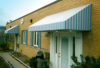 Greentree Entryway Awnings - Commercial welded frame shed style awnings 15a.