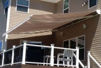 Residential adjustable pitch retractable deck awning 2.