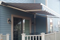Residential adjustable pitch retractable deck awning 13.
